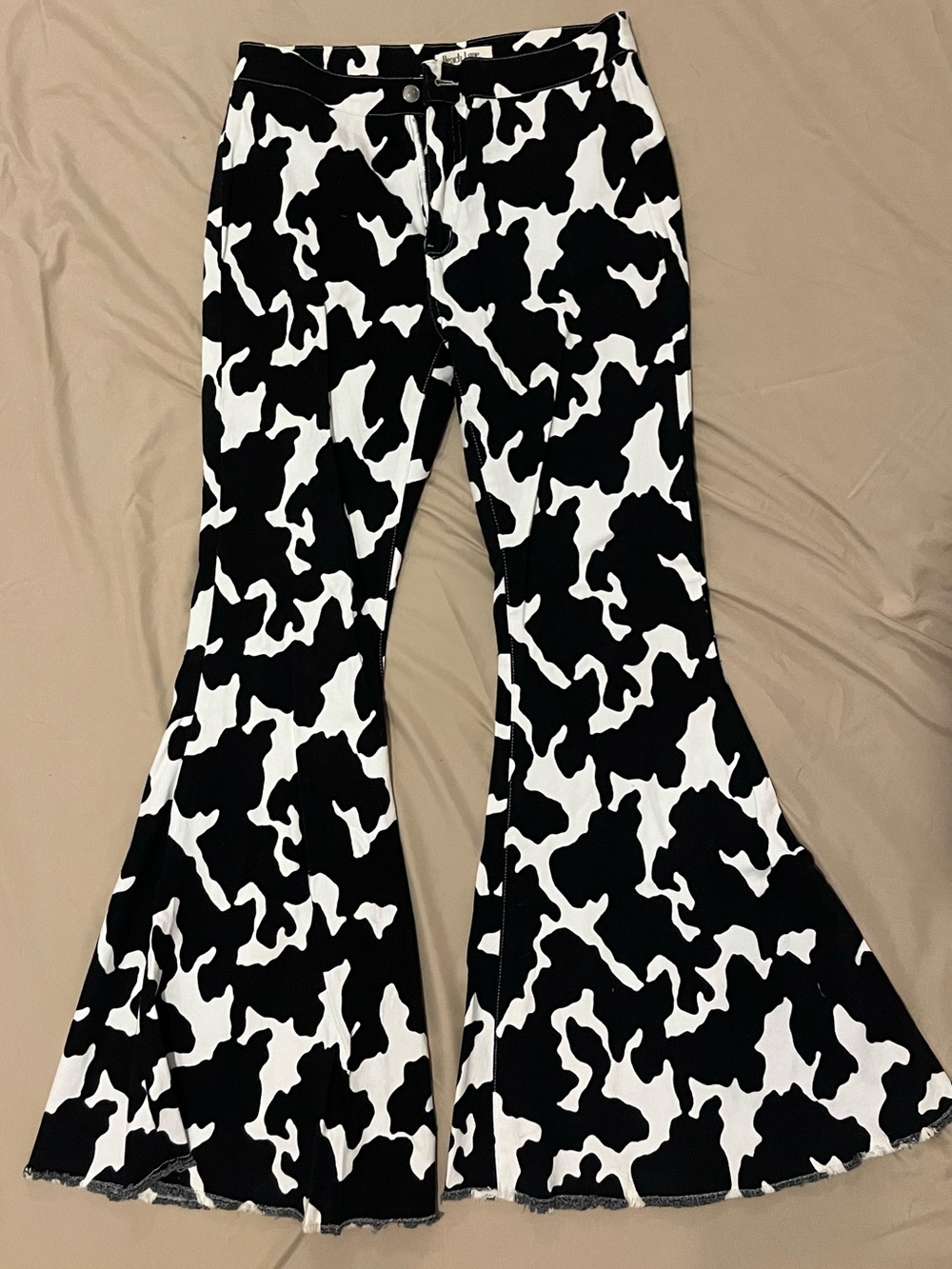 Black & White Cow Print Flared Pants